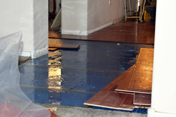 Professional Flood Damage Restoration technician working in Beverly, OH